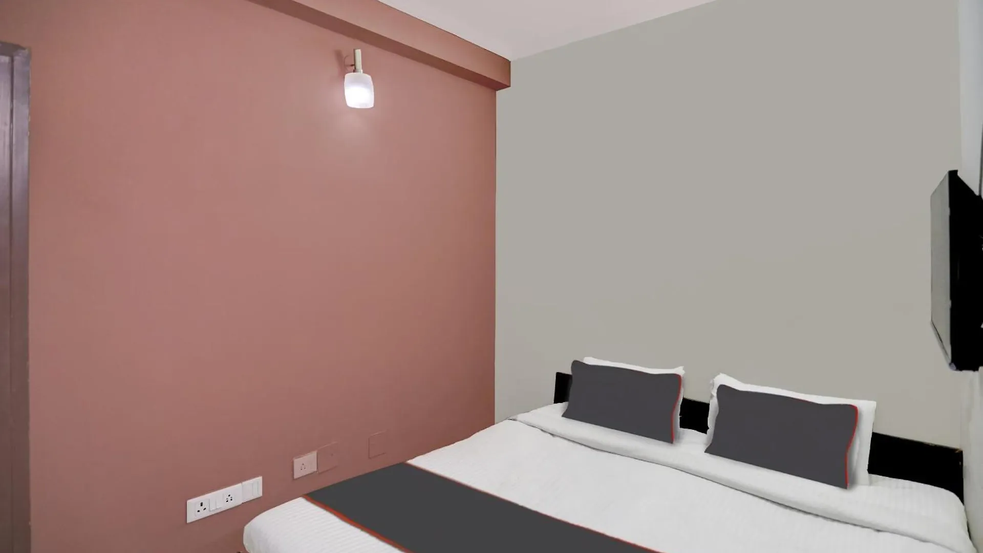 Hotel Capital O Uk House Residency Gurgáon