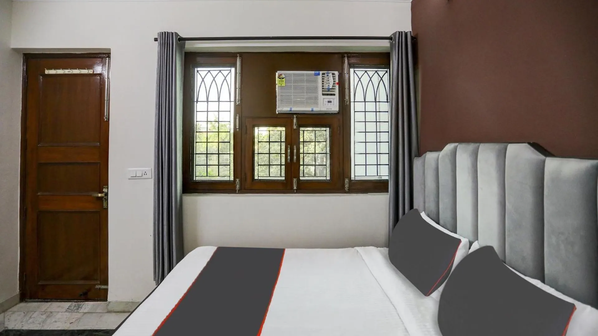 Hotel Capital O Uk House Residency Gurgáon